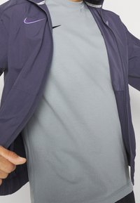 Nike Performance Klub merchandise - dark grey