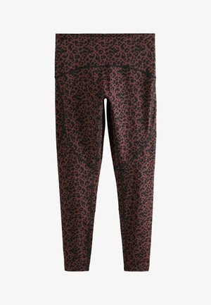 Barna és fekete leopárdmintás leggings, magas derékkal, texturált anyaggal és kontrasztos varrási részletekkel.