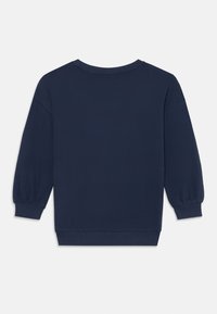 Felpa blu navy con maniche lunghe a palloncino, polsini e orlo ribattuti, realizzata in morbido cotone, con scollatura a girocollo.