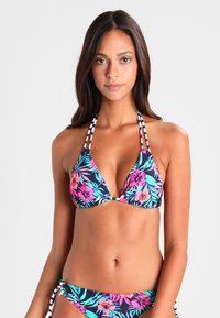 Floral-patterned bikini set featuring a navy background, pink and teal flowers, adjustable striped halter straps, and side-tie bikini bottoms.