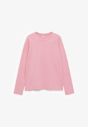 Langarmshirt in hellrosa, aus weicher Baumwolle. Mit rundem Halsauschnitt und lockerer Passform mit geraden Säumen. Einfaches Design, ohne Muster.
