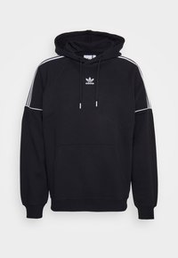 Felpa nera con cappuccio e tasca a marsupio, logo e dettagli bianchi, tre strisce bianche lungo le maniche e cappuccio regolabile con cordino. Realizzata in misto cotone.