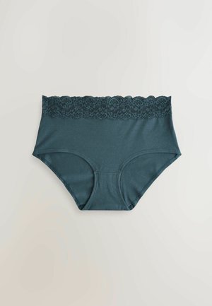 Mėlynos spalvos kelnaitės su aukštu liemens kirpimu ir banguota nėrinių apdaila juosmens srityje; pagamintos iš minkštos medžiagos su lygiu paviršiumi ir be matomų raštų.