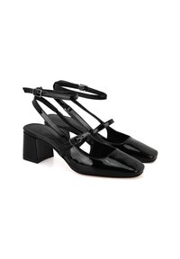 Schwarze Lackleder-High Heels mit quadratischer Zehenform, Blockabsatz und Knöchelriemen. Glatte Oberfläche mit verstellbaren Schnallen und Cut-Outs.