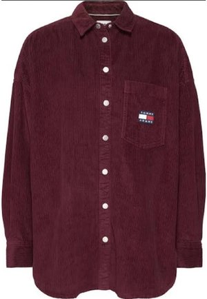 Bordowa sztruksowa koszula z długim rękawem, białe guziki i kieszeń na piersi z małą naszywką z logo Tommy Jeans.