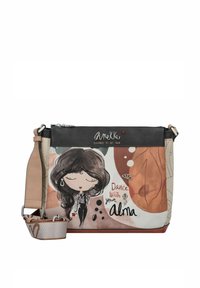 Borsa a tracolla realizzata in materiale sintetico. Presenta un'illustrazione colorata su uno sfondo crema e marrone, con chiusura a zip e tracolla regolabile.