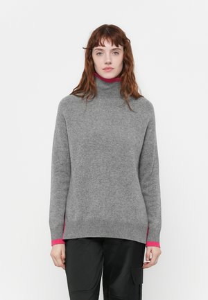 Grå turtleneck genser laget av mykt stoff, med rosa aksentkanter og sideslitser for ekstra stil og komfort.