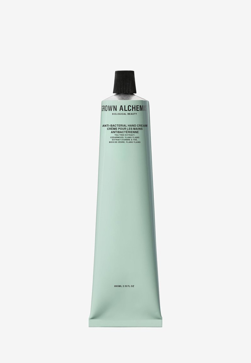 Crema per le mani antibatterica Grown Alchemist in un tubo metallico rigorosamente verde chiaro, con un tappo a vite nero e dettagli sugli ingredienti stampati.