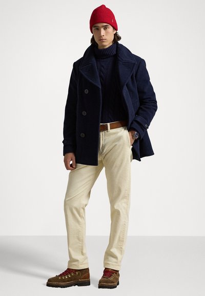 Polo Ralph Lauren STRETCH STRAIGHT FIT CORDUROY TROUSER - Hlače - guide cream