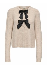 Beżowy dziany sweter rozpinany z długimi rękawami, ozdobiony dwoma czarnymi satynowymi kokardami na przodzie, z okrągłym dekoltem o prążkowanej fakturze.