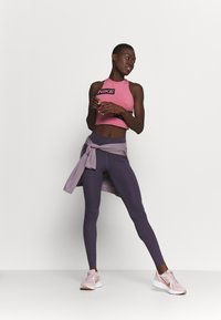 Nike Performance W NK ALL-IN LUX TGHT - Leggings - dark raisin