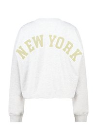Sudadera gris corta con "NEW YORK" impreso en beige claro, con puños acanalados y un escote redondeado. Textura suave.