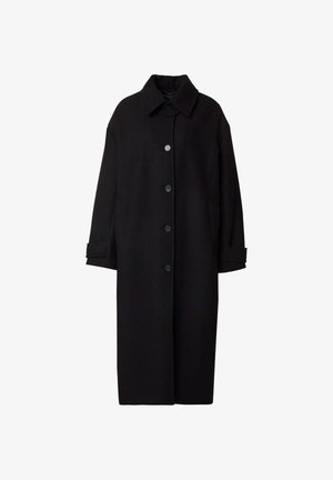 Black wool coat with a straight cut, large collar, and six buttons. Features side pockets and cuff detailing. Smooth texture and minimal design.