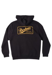 Sudadera negra con un bolsillo tipo canguro, que presenta un gran logo dorado de "Dcshoes" en la parte posterior, con el texto "DESDE 1994" y "MUNDIAL".