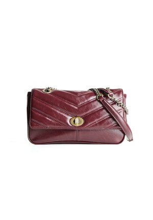 Burgundy leather shoulder bag with chevron quilting, gold-tone hardware, detachable chain strap, and front snap closure.