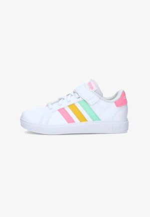 White athletic shoes with a smooth texture, featuring pink, yellow, and green stripes on the side and a velcro strap for closure.