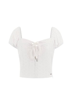 White cotton crop top with puff sleeves, eyelet detailing, and a front tie. Features a fitted bodice and a decorative logo accent.