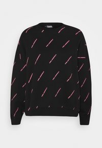 Sudadera negra con ajuste relajado, cuello redondo y patrón de logotipo rosa repetido en toda la tela. Material suave y texturizado.