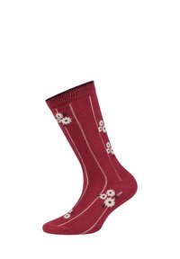 Rote Baumwollsocke mit weißem Blumenmuster und schmalen weißen Streifen. Gerippter Bund oben und glatte Textur überall.
