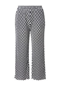 Pantalons larges à carreaux noir et blanc avec une taille élastique et une texture côtelée ; l'ourlet présente un détail en bordure festonnée.
