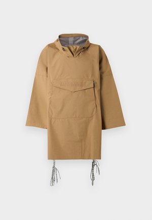 Brown waterproof anorak with a high collar, front pocket, and adjustable drawstrings at the hem. Smooth texture and relaxed fit.
