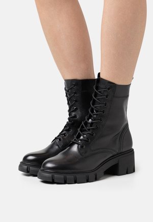 Tamaris Botines con plataforma - black