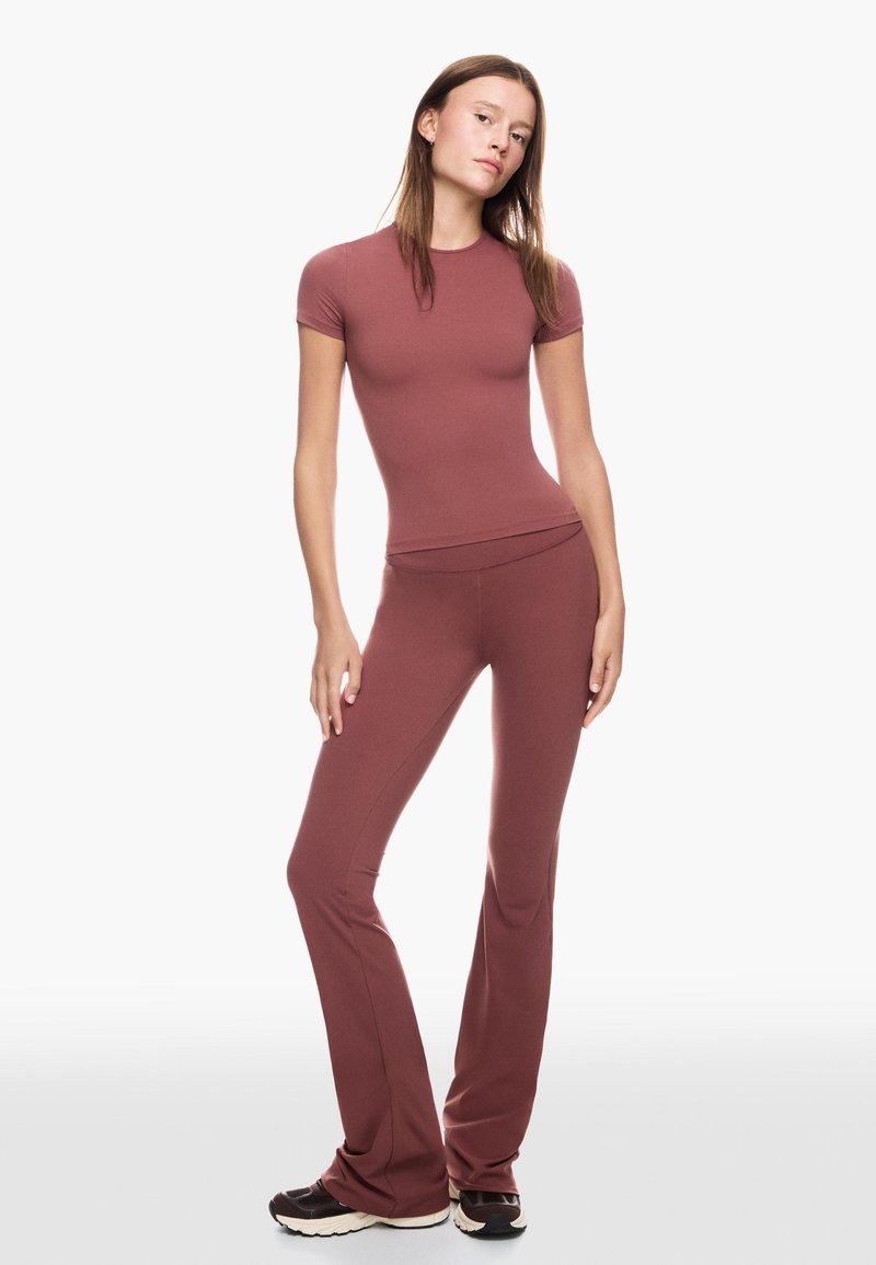 Bershka Tygbyxor - orange