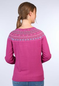 Purple long-sleeve sweater featuring a patterned yoke with blue and pink accents. Soft fabric with a slightly fitted cut, plain back.
