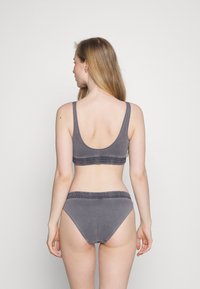 Calvin Klein Swimwear Bikinio apatinė dalis -  black