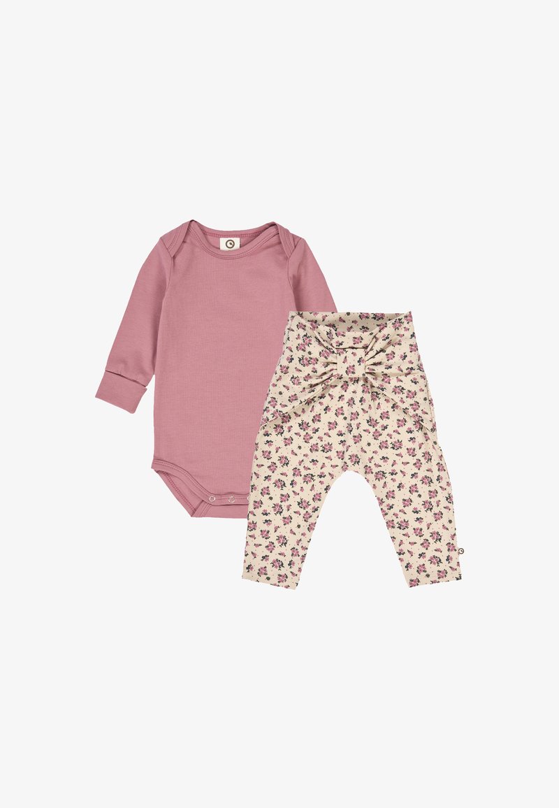 Pink long-sleeve bodysuit with snaps, paired with cream floral-printed leggings featuring a bow detail at the waist. Soft, textured fabric.