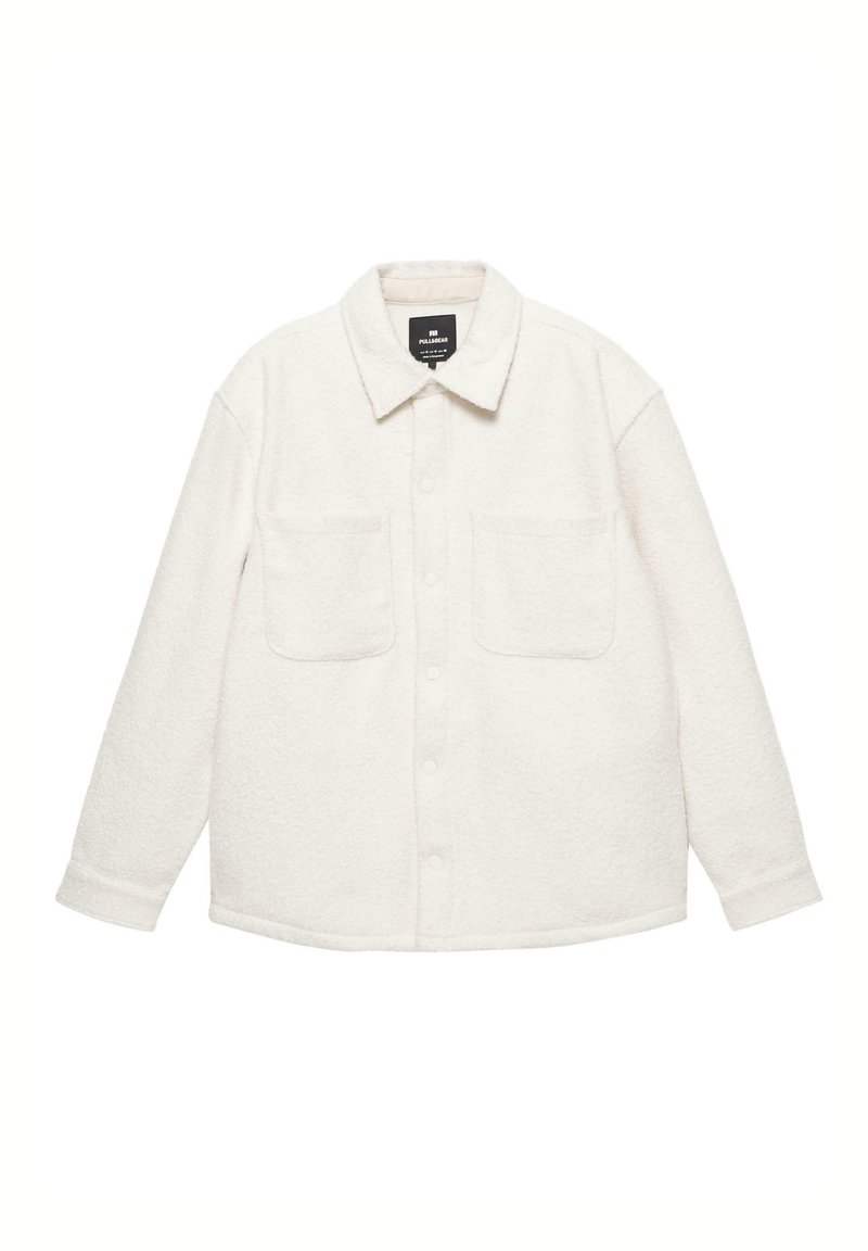 Hvid fleece skjortejakke med krave, to brystlommer, knaplukning og struktureret stof.