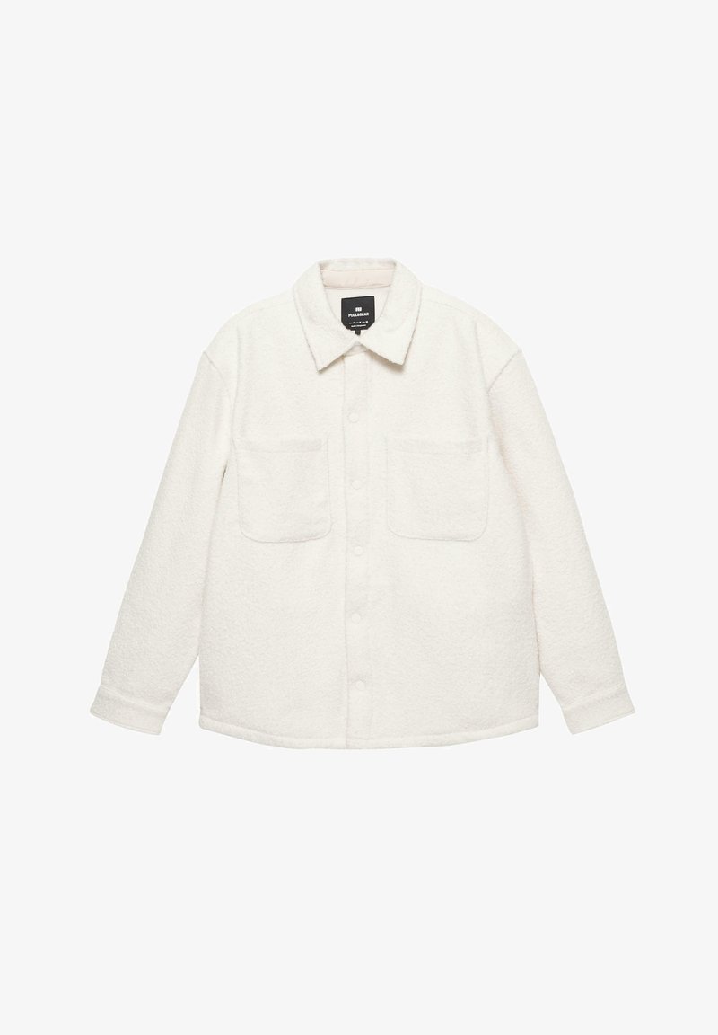 Hvid fleece skjortejakke med krave, to brystlommer, knaplukning og struktureret stof.