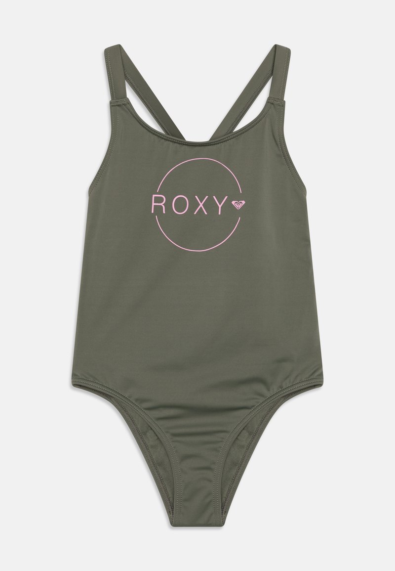 Olivgrön baddräkt med justerbara korsade band, med en rosa "ROXY"-logotyp omgiven av en cirkulär design på framsidan.