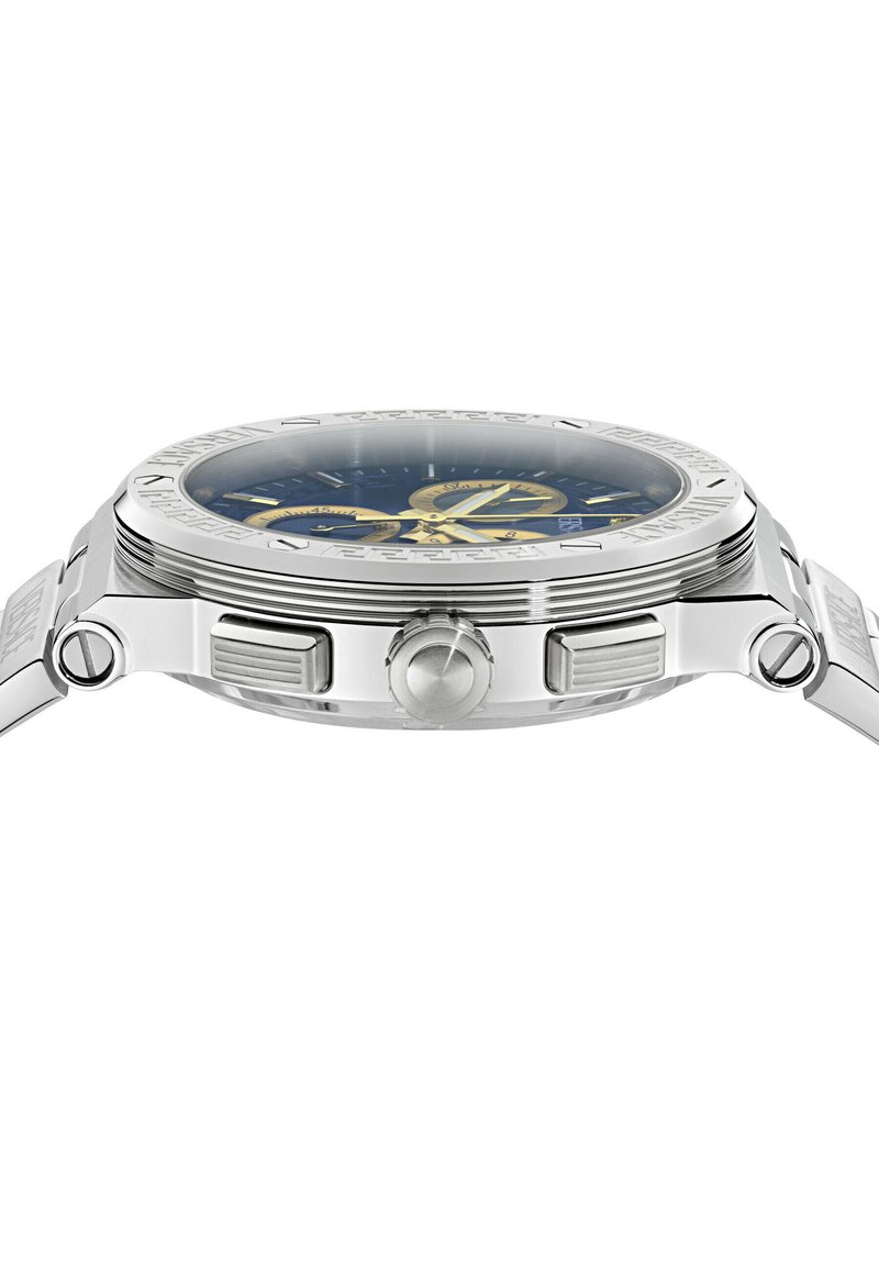 Silver stainless steel watch with a blue dial, gold accents, a round bezel, chronograph sub-dials, and a textured strap.