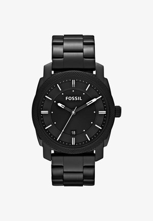 Montre analogique Fossil noire avec bracelet en métal, index blancs, affichage de la date à 6 heures et trois aiguilles indiquant 10:09:37.