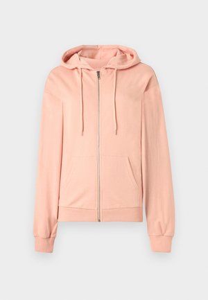 Light pink zip-up hoodie with front pockets, drawstring hood, and ribbed cuffs and hem, displayed on a white background.