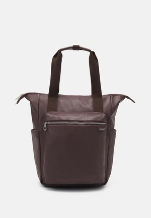Brown tote bag with two dark fabric handles, front zip pocket, side pockets, and top zipper closure, displayed on a white background.