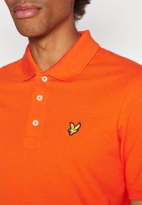 Lyle & Scott Polo - tangerine tango