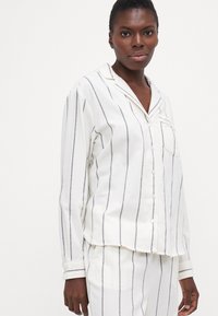 GAP Pidžaamakomplekt - ivory/black