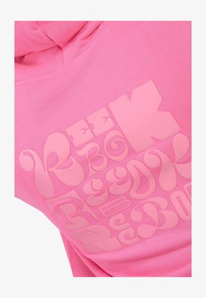 Pink hoodie with large, stylized, retro bubble letters printed on the chest forming an abstract design.