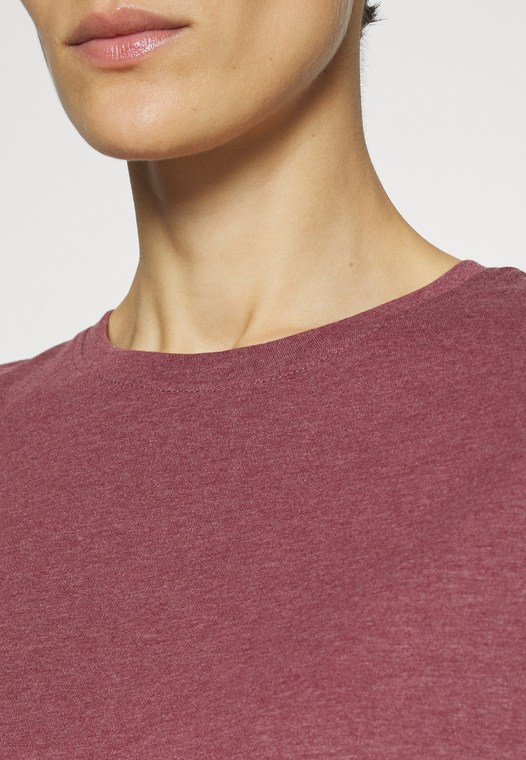 pink open back shirt
