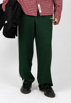 PROHIBITED, VARSITY TRACKPANTS UNISEX - Tracksuit bottoms - dark green