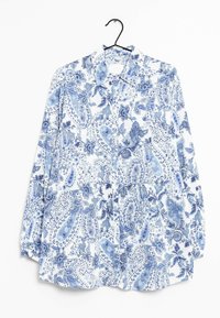 Camicia a maniche lunghe con motivo paisley blu e bianco, con colletto, realizzata in tessuto liscio e con chiusura a bottoni.