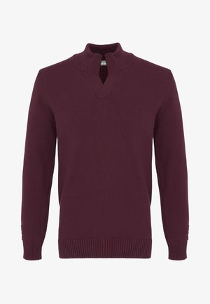 Bordeauxroter Strickpullover mit langen Ärmeln, gerippten Bündchen und Saum sowie einem kurzen Reißverschluss am hohen Kragen.
