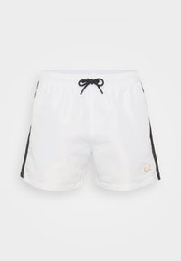 Atlasīts, white