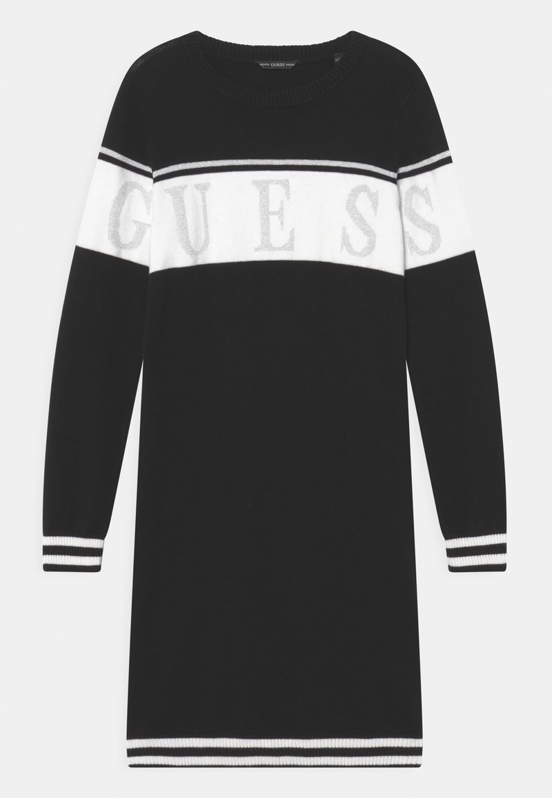Robe en maille noire avec des rayures blanches et un grand logo "GUESS". Dotée d'un col rond côtelé et de poignets avec des accents de rayures contrastantes.