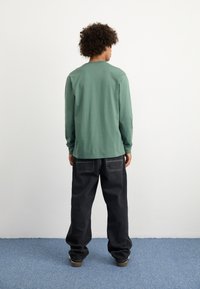 Carhartt WIP POCKET - Hosszú ujjú felső - duck green