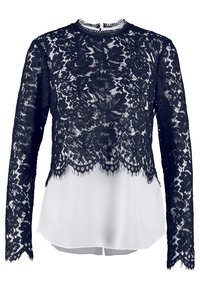 Svart blommig spets med lång ärm som är lager över vit sidenliknande tyg med vågig spetskant och rund halsringning.