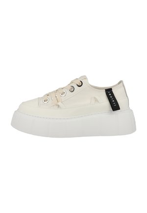 Low-top off-white platform sneaker with thick sole, cream laces, metal eyelets, and black fabric pull tab with white text on heel.