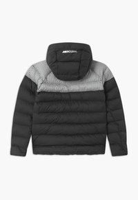 Nike Performance CR7 PADDED  - Giacca invernale - black/white/iridescent